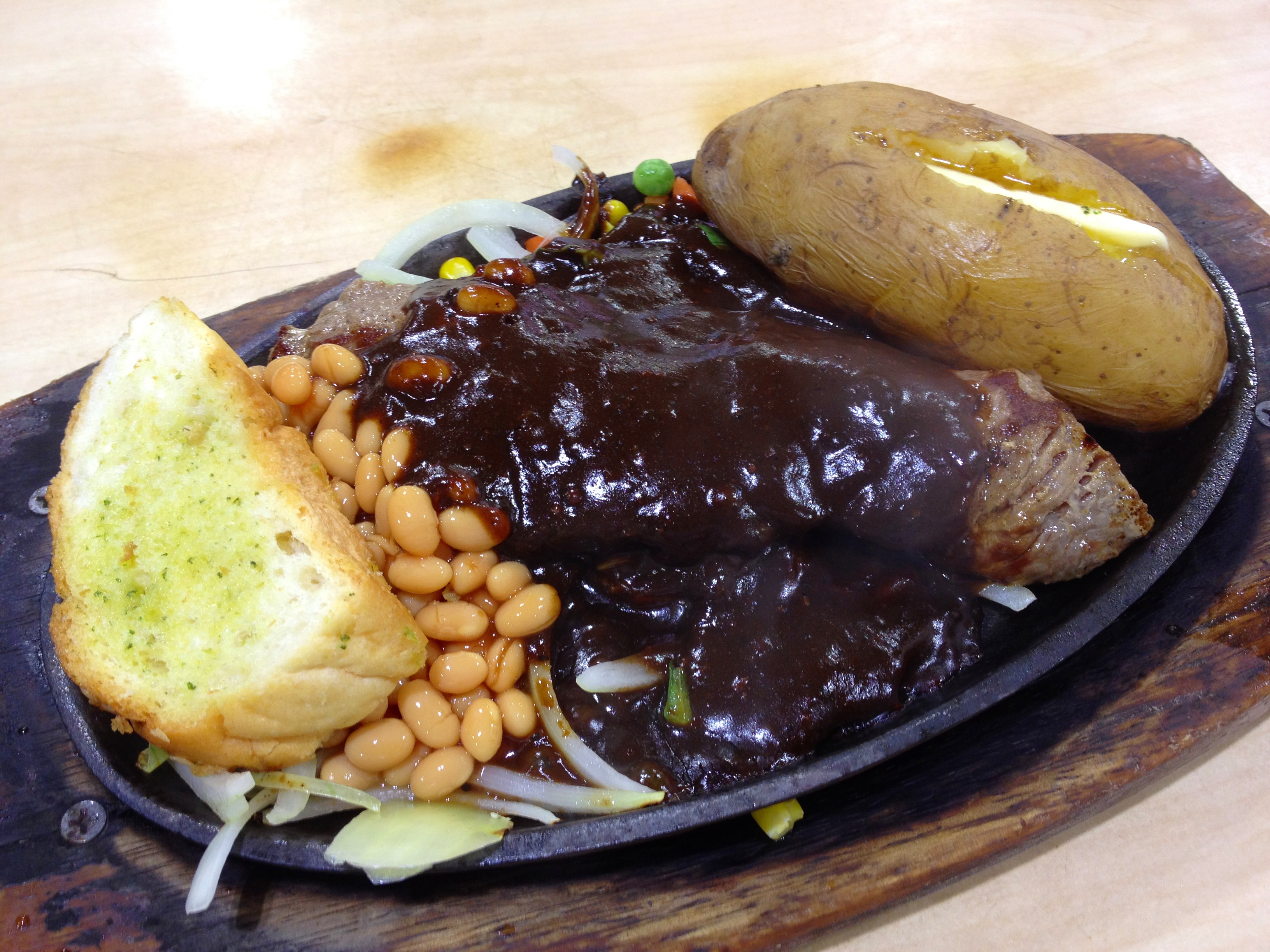 Steak grillé sauce au poivre